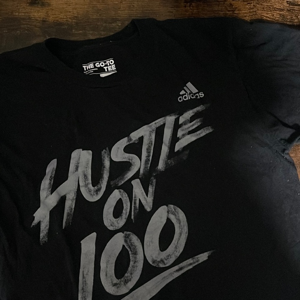 Like new Adidas logo hustle on 100 t shirt